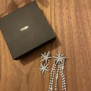 Maje - Boucles d'oreilles étoiles asymétrique